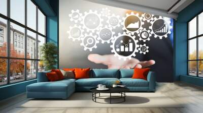 Gear cogs is connected to financial charts, KPI, and graphs. Business Process Data Analysis concept Wall mural