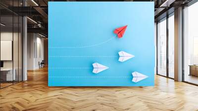 Group of paper plane in one direction and with one individual pointing in the different way. Business concept for new ideas creativity and innovative solution. Wall mural