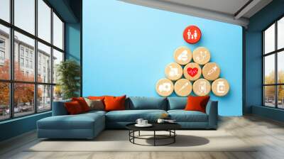 Health insurance concept, wooden blocks with healthcare medical icon, blue background, copy space Wall mural