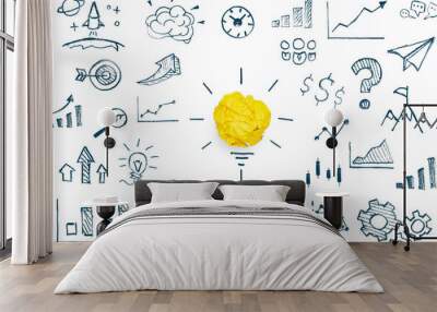 Innovation and solution with crumpled yellow paper light bulb on white background Wall mural