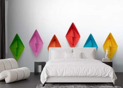 Multicolored paper boats on a white background, business competition concept with copy space Wall mural