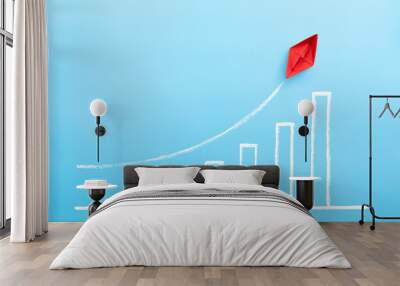 Red paper ship with growing a sketch graph on blue background, Growth and successful concept. Wall mural