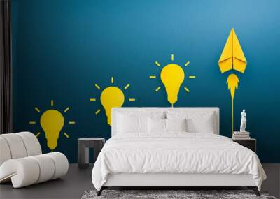 Yellow light bulb and paper plane, Success in business growth, innovation and idea concept Wall mural