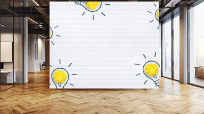 Yellow paper light bulb on notebook. Creative idea, innovation and Inspiration, copy space Wall mural