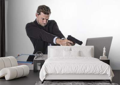 businessman pointing gun to computer in overwork overtime work Wall mural