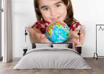 Cute lgirl holding little World Globe on her Hands Wall mural