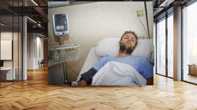 sick patient lying in bed hospital room resting from pain in bad health condition Wall mural