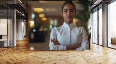 Black female hotel staff, copy space, angry
 Wall mural