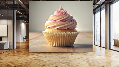 A decorated cupcake with cream and frosting on a wooden table. Wall mural