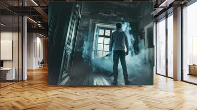 A man haunted by a ghost, with no exorcist or protection, in a haunted house Wall mural