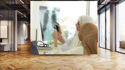 Muslim doctors explain the health examination results of Muslim women. That receives annual health checks Which the results came out good. Wall mural