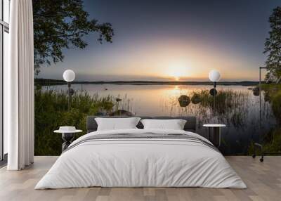 Calm and relax scenery at twilight sunset over big swamp lake in Estonia Wall mural