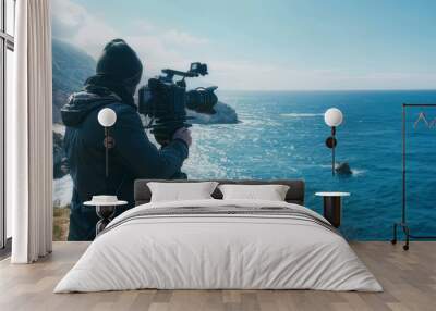 A professional videographer filming on location, capturing high-quality footage with expertise and precision Wall mural