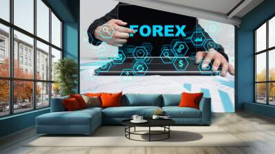 Businessman is pointing on virtual screen and selecting Forex. Wall mural