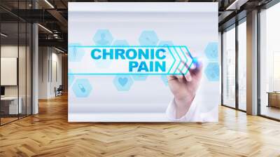 Medical doctor drawing chronic pain on the virtual screen. Wall mural