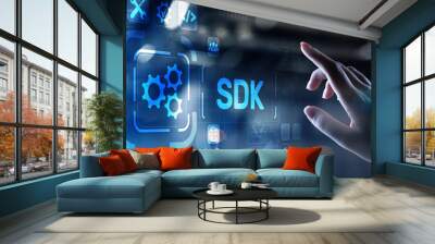 SDK Software development kit programming language technology concept on virtual screen. Wall mural