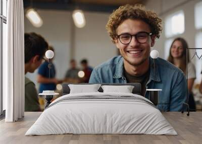 Young smiling western man on art workshop Wall mural