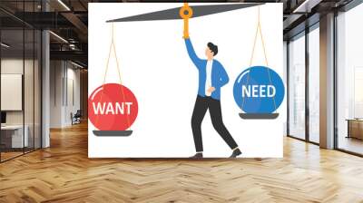 Businessman balancing between need and want, Business concept

 Wall mural