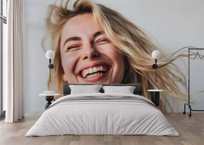 Beauty portrait of blonde smiling laughing woman 35 year clean fresh face isolated on white background Wall mural