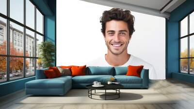 Handsome young man with his arms crossed against a white background Wall mural