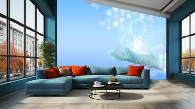 Innovation. Concept new idea concept with innovation and inspiration, hands holding a light bulb Medical technology, digital healthcare, and network connection via hologram virtual interface. Wall mural