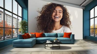 portrait of a Happy woman looking at camera on white background Wall mural