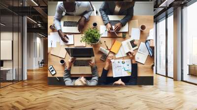 Top view of group of multiethnic busy people working in an office, Aerial view with businessman and businesswoman sitting around a conference table with blank copy space with generative ai Wall mural