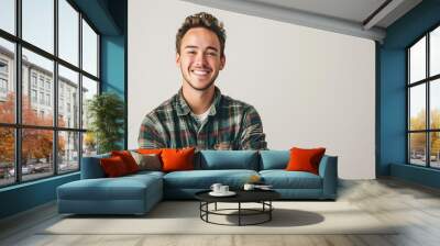 Young, handsome and friendly face man smile, dressed casually with happy and self-confident positive expression with crossed arms on white background studio shot. Concept for good attitude boy Wall mural