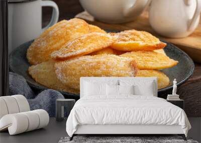 Traditional madeleines with sprinkled sugar. Wall mural