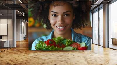 Black Woman Smiling and Holding a Bowl of Fresh Salad Wall mural