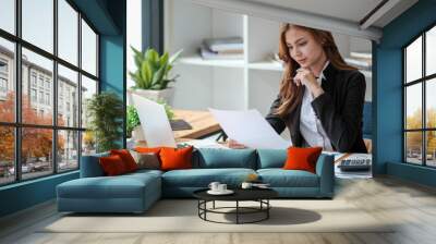 Successful happy smiling businesswoman saleswoman working on laptop computer, Young female making on video conference meeting online zoom, Accounting woman do taxes calculation interest rates law firm Wall mural