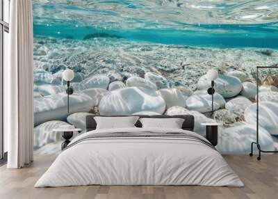 White pebbles on the bottom of clear water, a light blue and white style. Wall mural