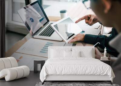 business partnership coworkers using a tablet to analysis graph company financial budget report and  Wall mural