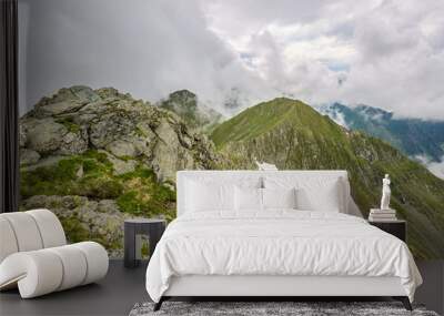 Misty rocky mountains Wall mural