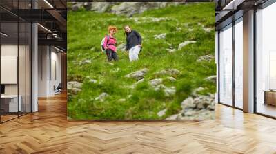 Woman hiker with backpack Wall mural