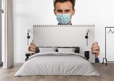 Young man with mask and whiteboard Wall mural