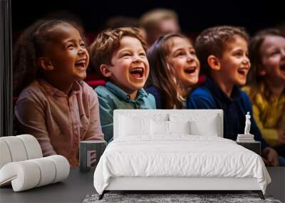 A group of children laughing during a comedic theater performance. Wall mural