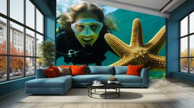 Captivating young marine biologist, hazel-eyed, in wetsuit holding a starfish; side view with composed space; vibrant blurred underwater reef background. Generative AI Wall mural