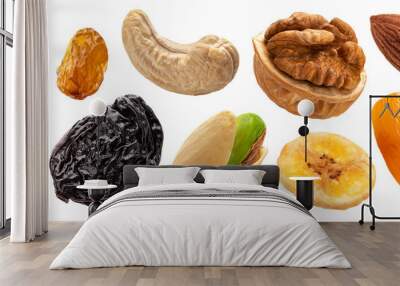 Set of nuts and dried fruits isolated on white background Wall mural