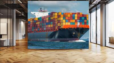 A large cargo ship is sailing in the ocean Wall mural