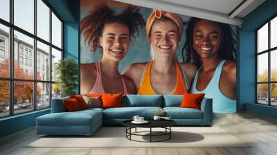 Group of female athletes celebrate their healthy and active lifestyle in a sports studio Wall mural