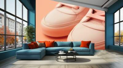 sport sneakers in peach fuzz color Wall mural