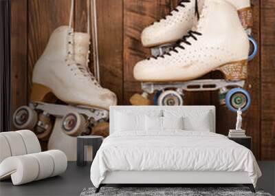 artistic roller skates on a wood background Wall mural