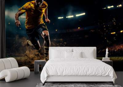 panorama of soccer player kicking towards goal in football stadium at night Wall mural