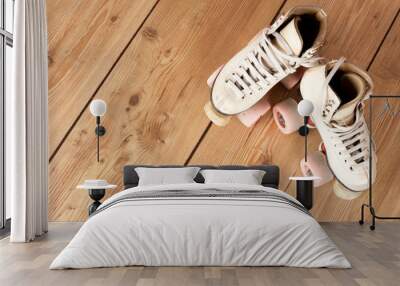 roller skates on a wood background Wall mural