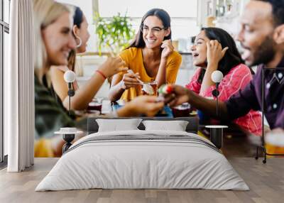 International group of young student friends having breakfast drinking and eating together in coffee shop - People, food and beverage concept Wall mural