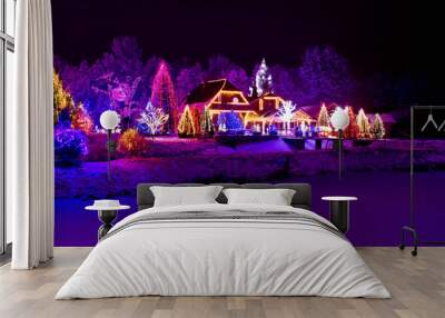 Christmas fantasy - park, forest & lodge in xmas lights Wall mural