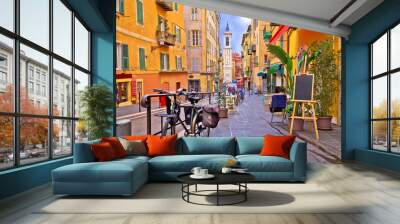 Nice colorful street architecture and church view Wall mural