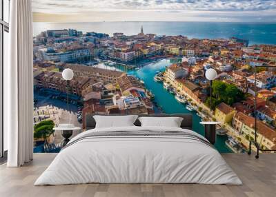 Town of Grado colorful architecture and channels aerial view, Friuli-Venezia Giulia Wall mural