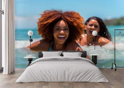 two young smiling African American woman having a bath in the beach, AI generatedAI generated, AI generated Wall mural